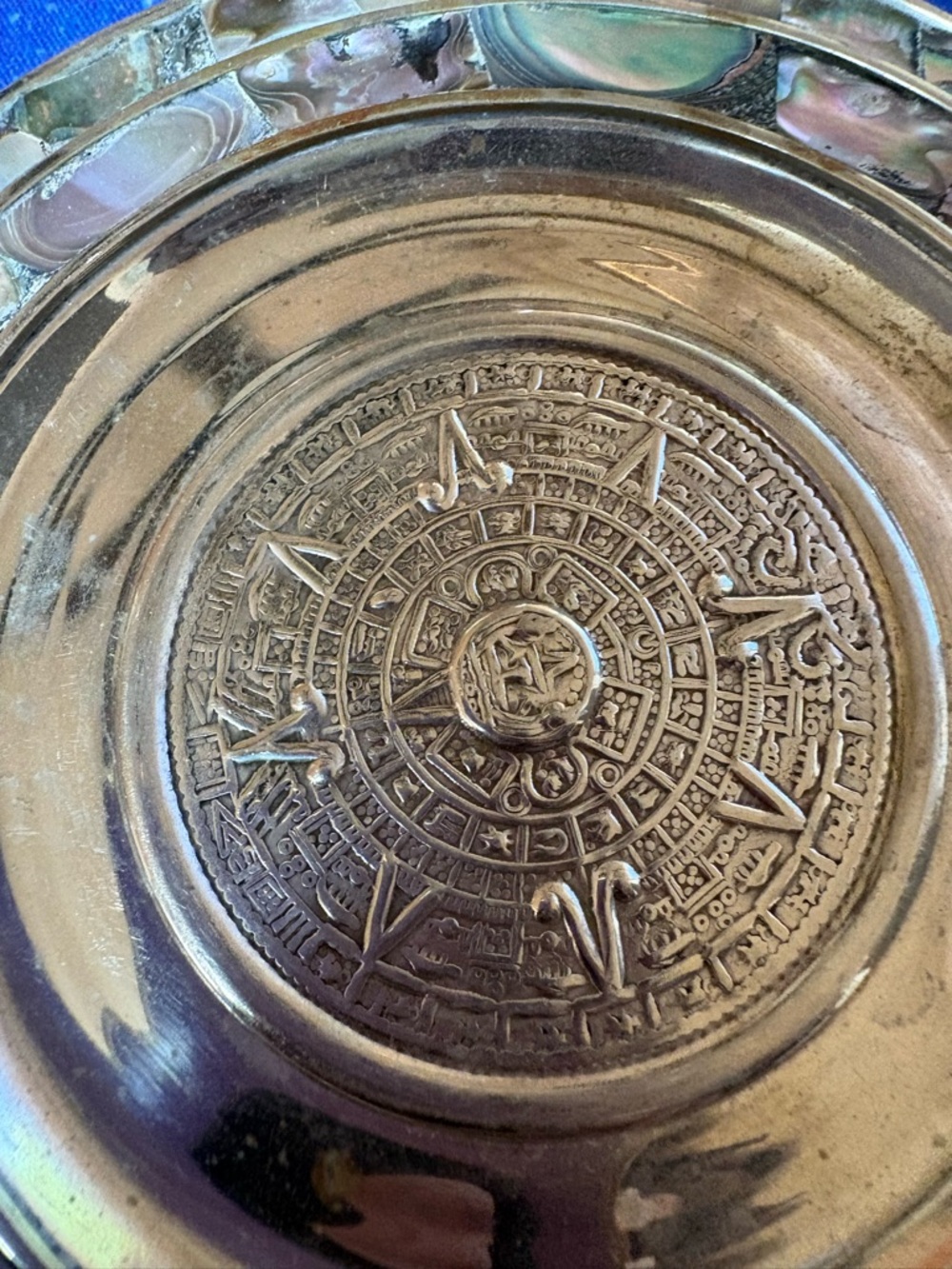 vintage Mexican alpaca silver tray featuring a central embossed